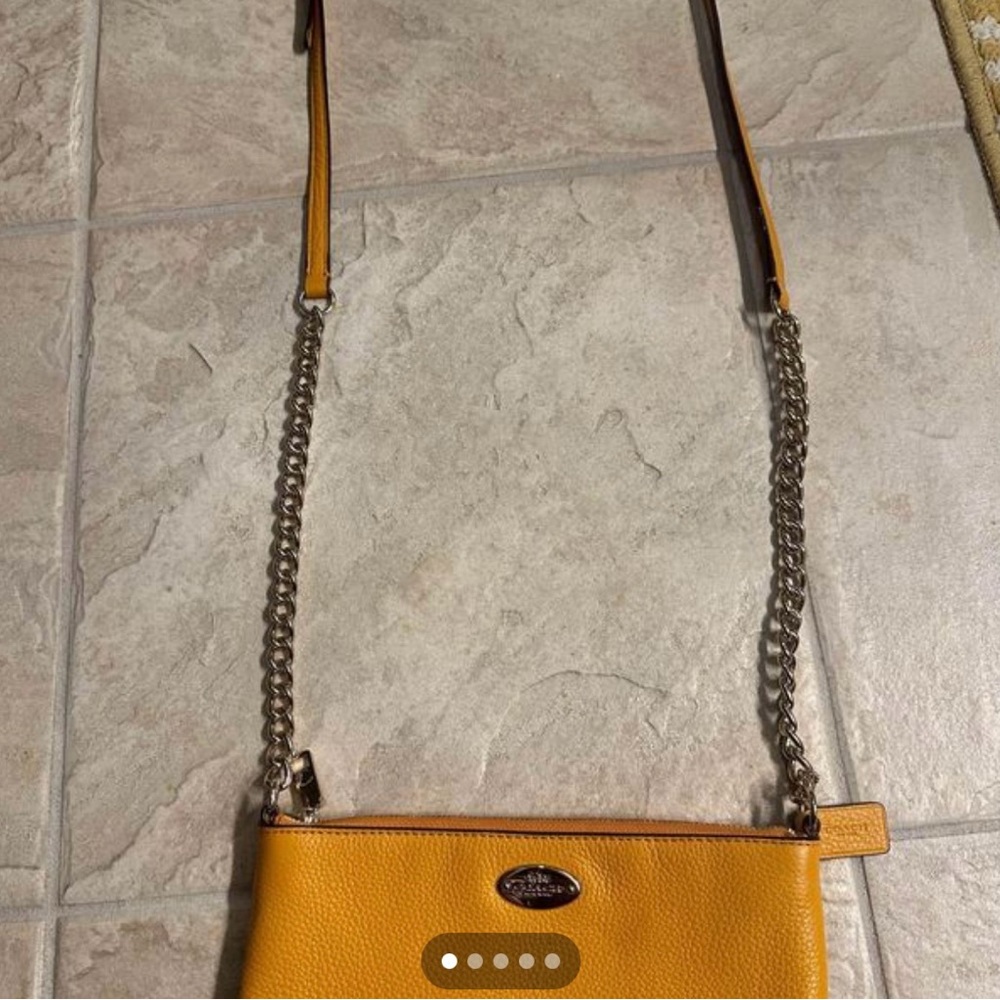 Coach crossbody purse, never been used, beautiful light orange color!